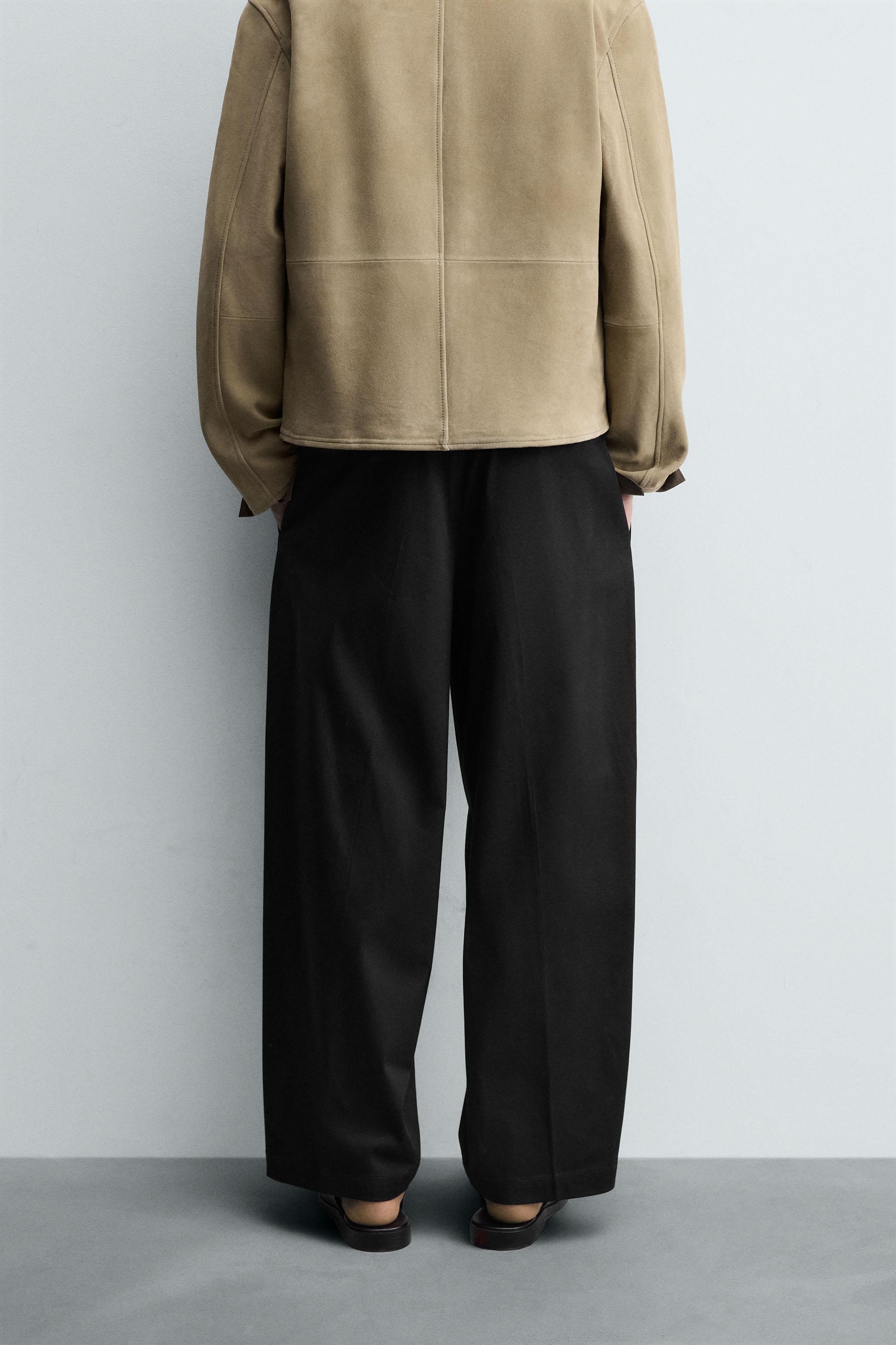 RELAXED FIT PLEATED PANTS